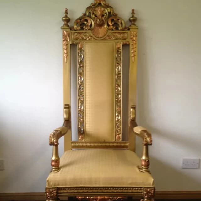 Ornate gold armchair available for hire